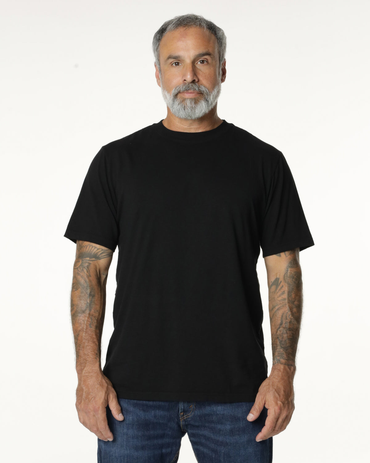Man wearing a black Premium t-shirt. Model is 5'11", 198lbs wearing size L