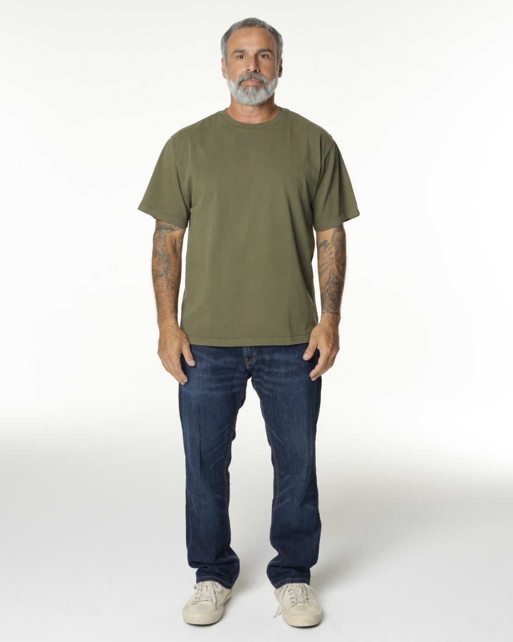 Man wearing a Military Drop Shoulder t-shirt. Model is 5'11", 198lbs wearing size L