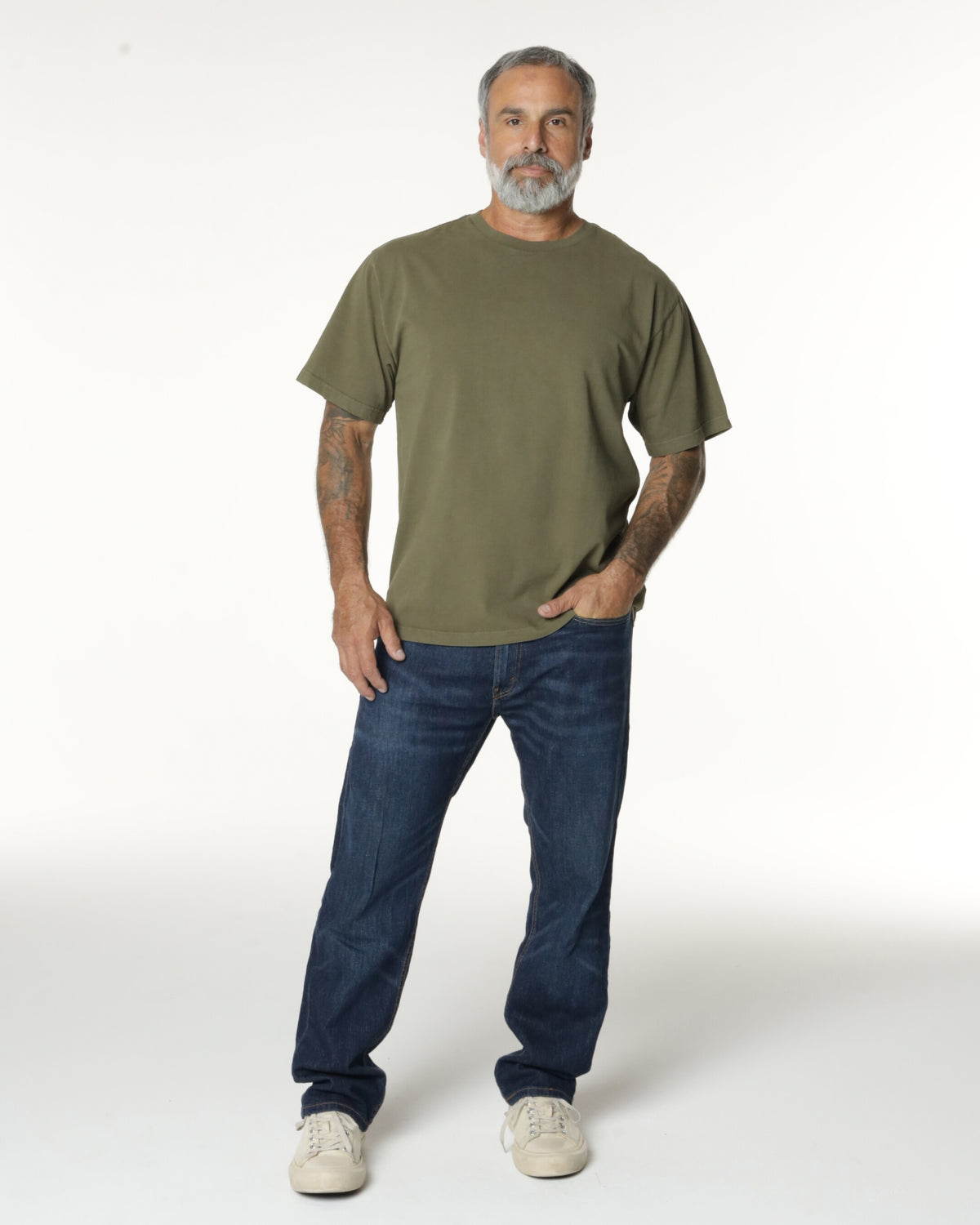 Man wearing a Military Drop Shoulder t-shirt. Model is 5'11", 198lbs wearing size L