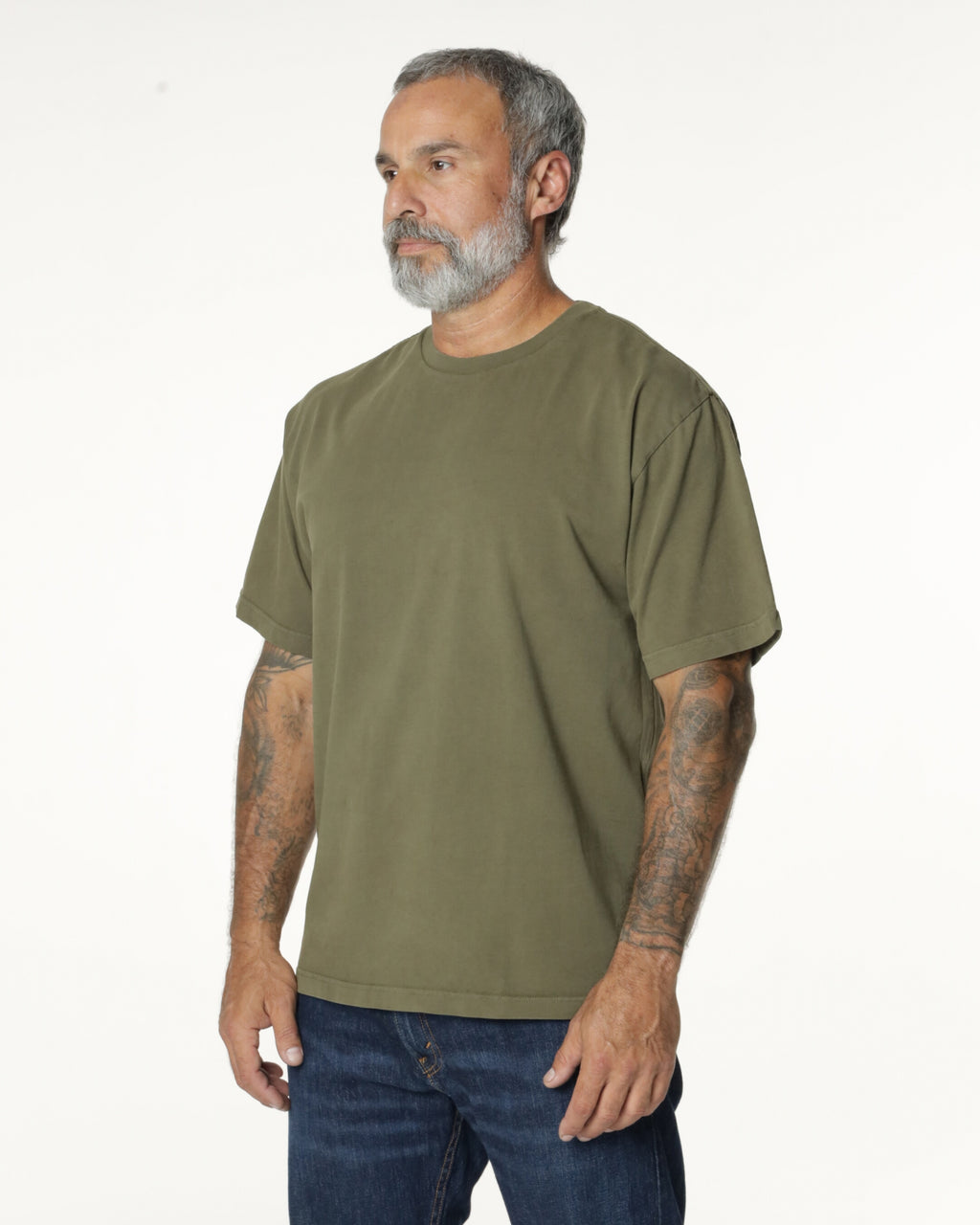 Man wearing a Military Drop Shoulder t-shirt. Model is 5'11", 198lbs wearing size L