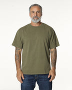 Man wearing a Military Drop Shoulder t-shirt. Model is 5'11", 198lbs wearing size L