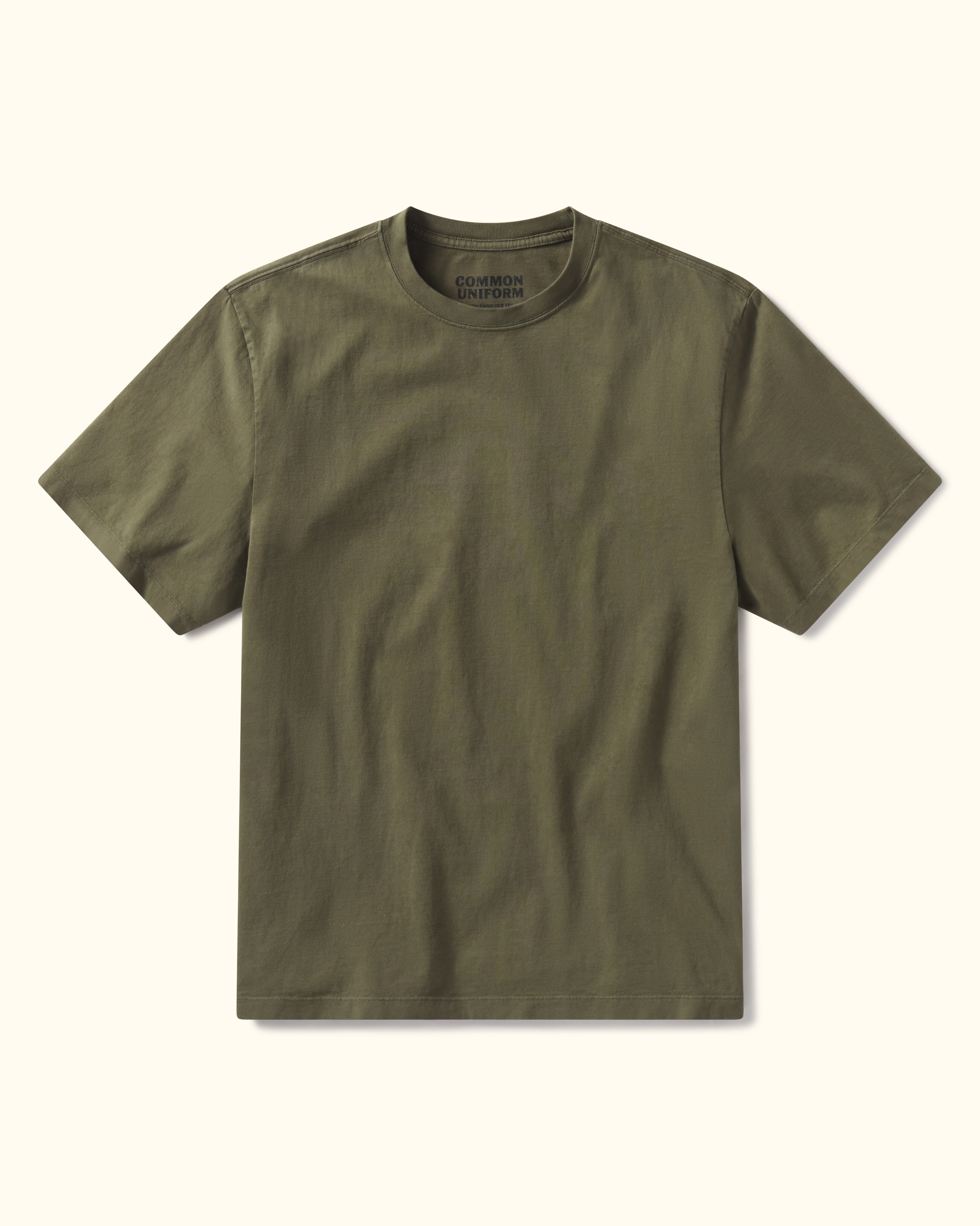 Green t-shirt on a white background