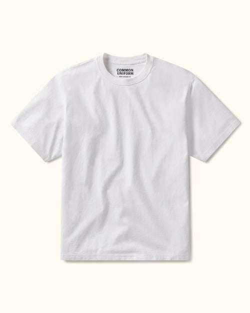 White t-shirt with 'Common Uniform' logo on a white background