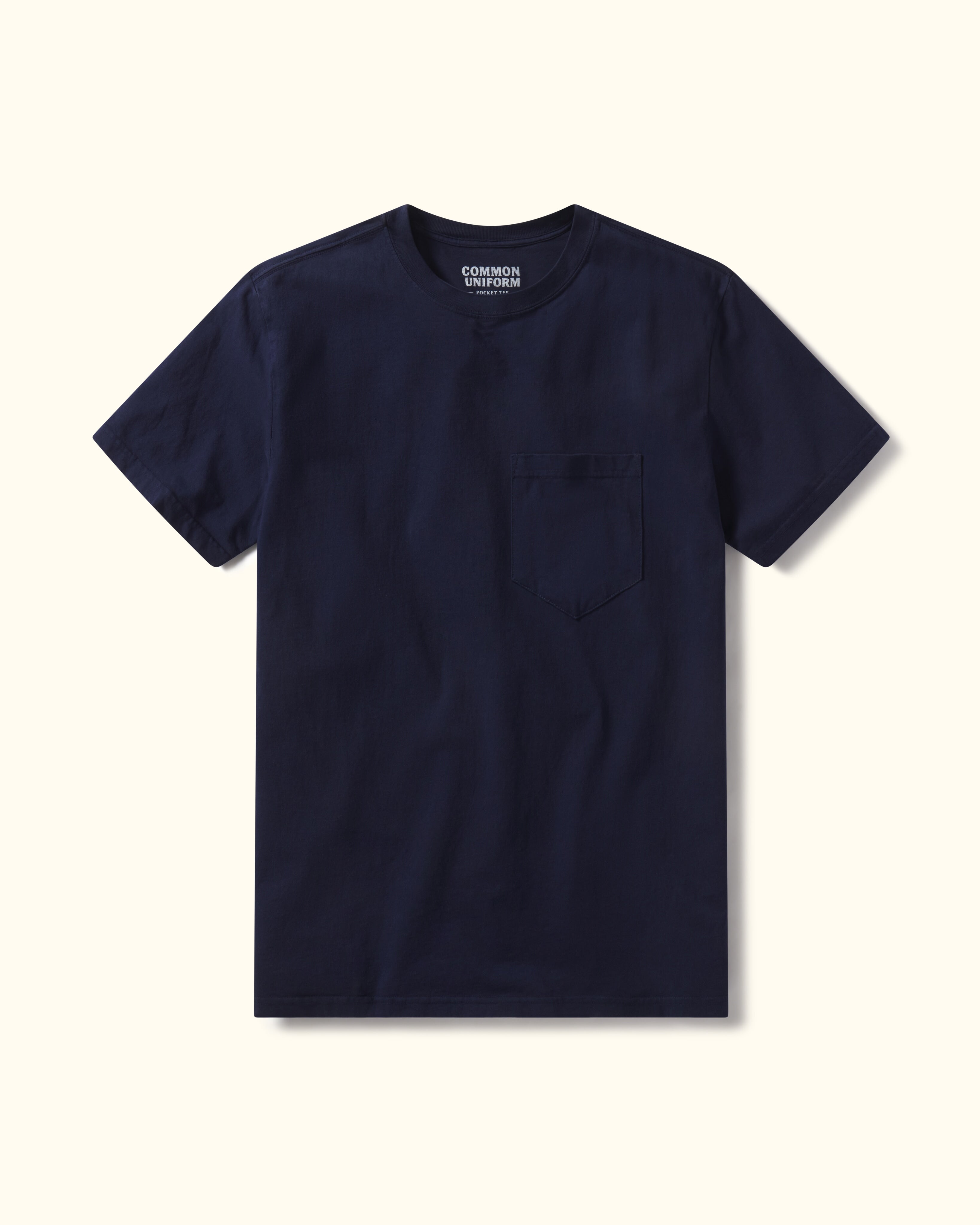 Navy blue t-shirt with a pocket on a white background