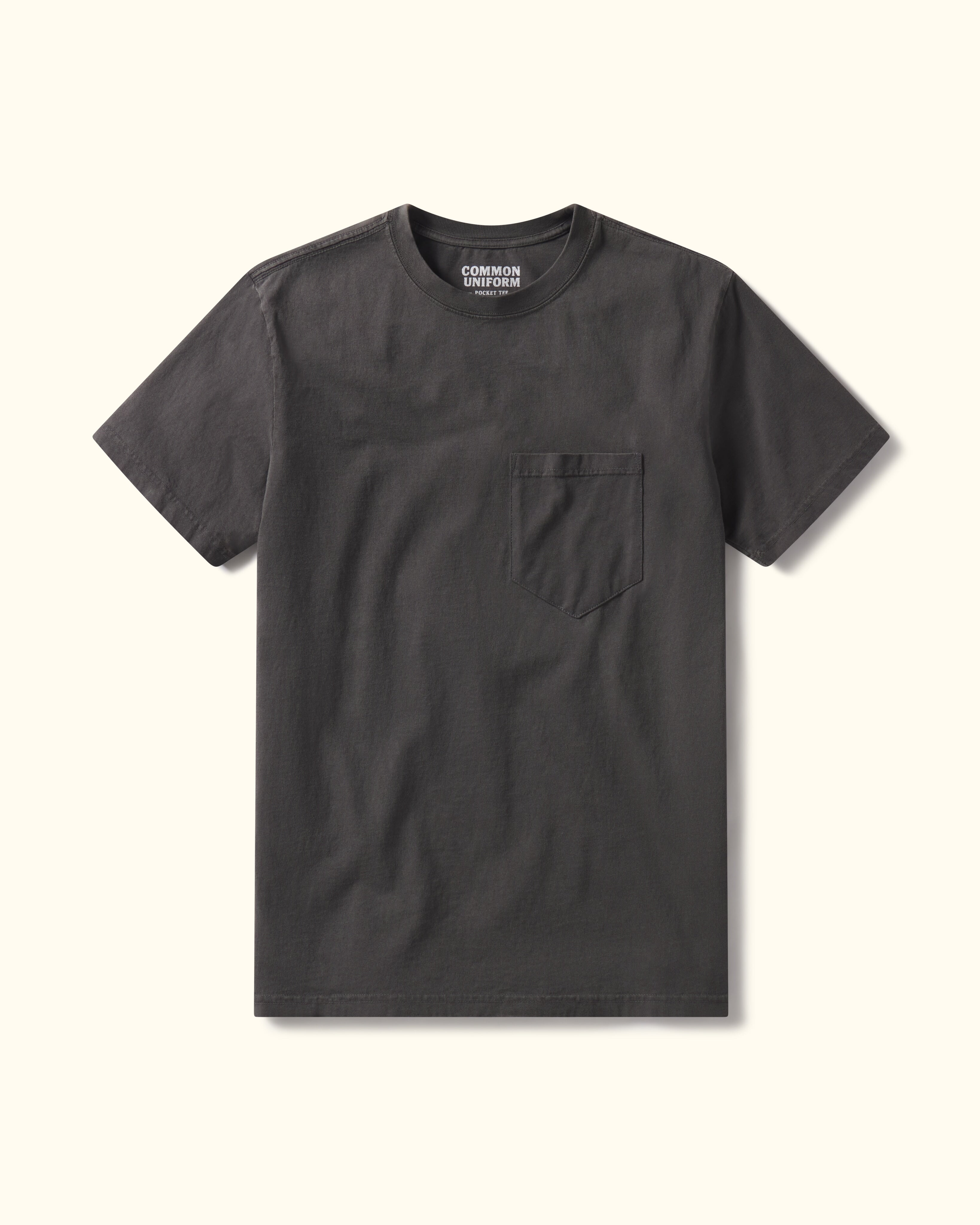 Steel Grey t-shirt with a pocket on a beige background